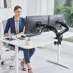 حامل شاشتين مثبت بحافة مكتب — Dual monitor mount clamped to a desk