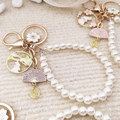 Cute Fu wreath pearl cherry blossom rabbit keychain bag pendant DIY gift U disk hanging pendant female gift - Nimall