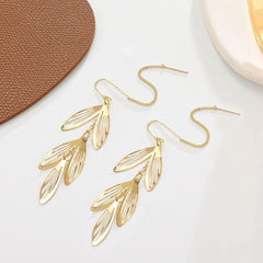 Hollow leaf earrings women's fashion light luxury design long fringed earrings - Nimall