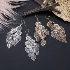 Stylish and simple multi - layer hollow leaf earrings, long leaf earrings. - Nimall