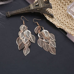 Stylish and simple multi - layer hollow leaf earrings, long leaf earrings. - Nimall